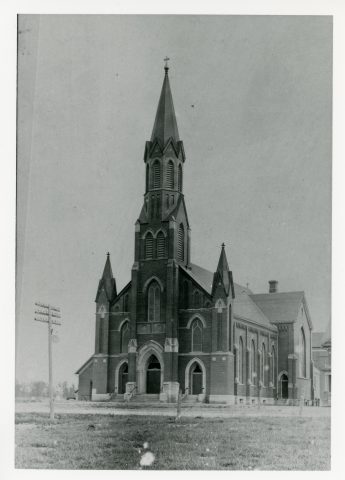 St. Rose Church, Ohio. Built in 1912. This is the third church in St. Rose. Part of the one room school house is visible to the left of the photo.